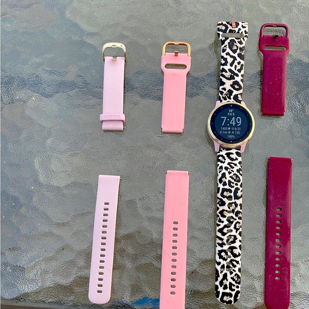 Vivoactive 4s Garmin watch. No scratches. Comes with charger and 4 bands.